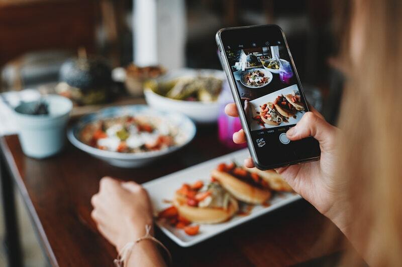 Gundry Health person taking photo of the food on the table