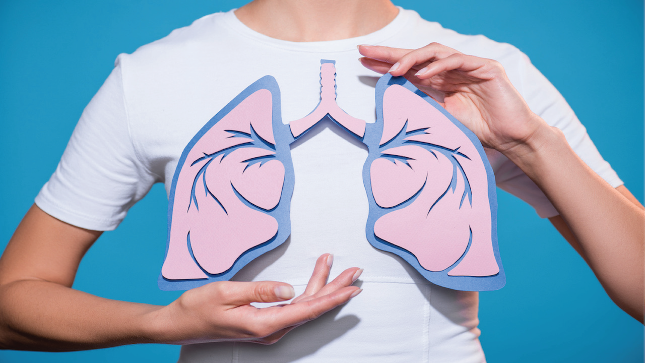 Gundry Health woman holding cardboard lungs