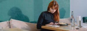 young lady searching on her phone